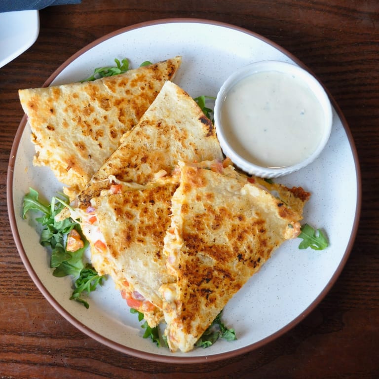 Indulge in Our Quesadilla